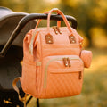Sac à Dos à Langer Rose Pastel - accroché à la poussette | BebeSac